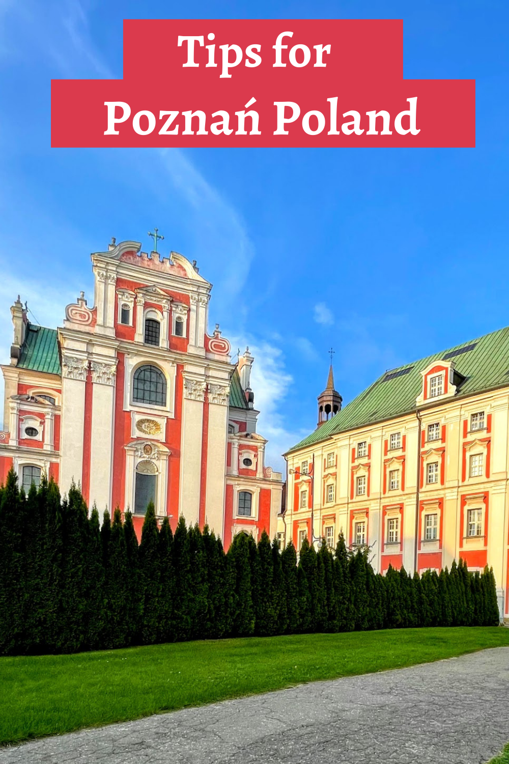 Poznań Poland blog cover photo with the cathedral in the picture that's pink